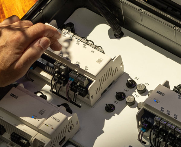 Hand operating components of an indoor building automation control system